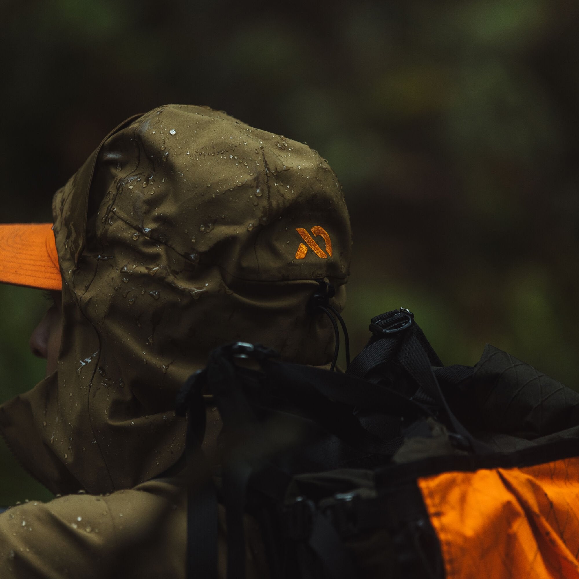 cdn_shop_files_omen-stormshelter-jacket_global_dry-earth-hood-back